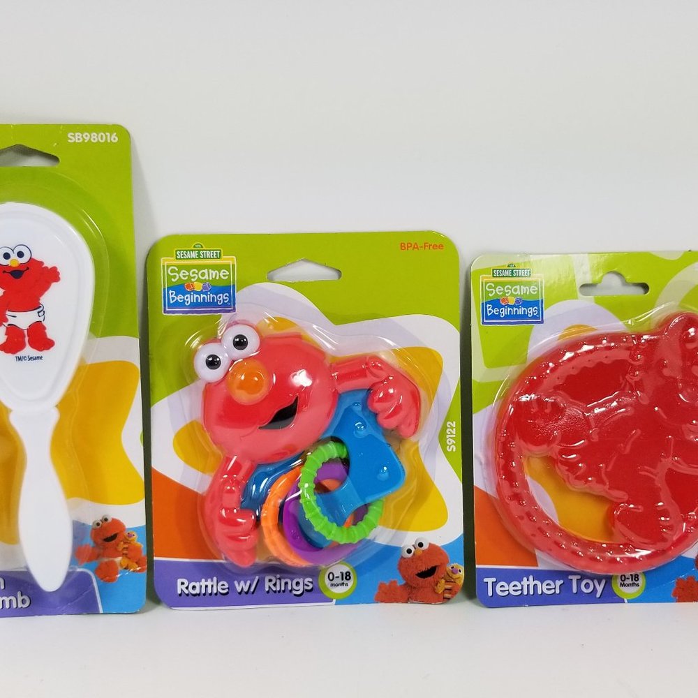 Elmo brush and comb set, rattle and teething wheel